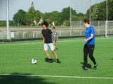 Laatste training S.K.N.W.K. JO11-1JM van seizoen 2022-2023 (partijtje tegen de ouders) (73/221)